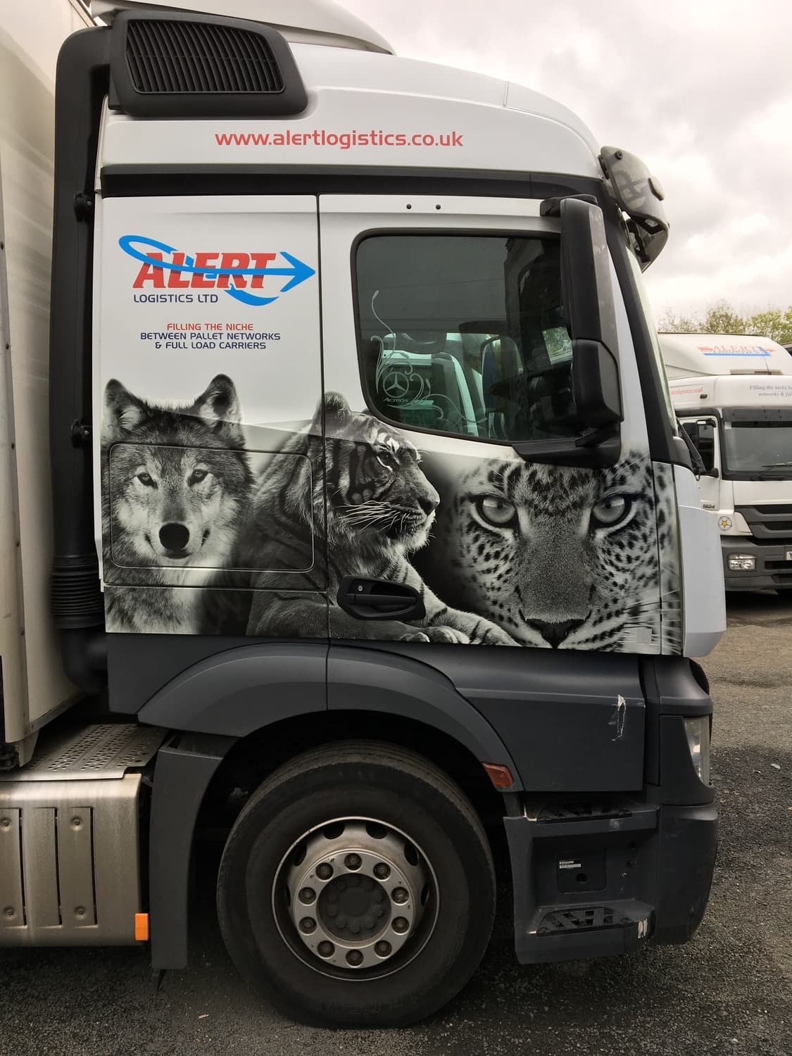 Truck cab with wolf, fox and leopard livery