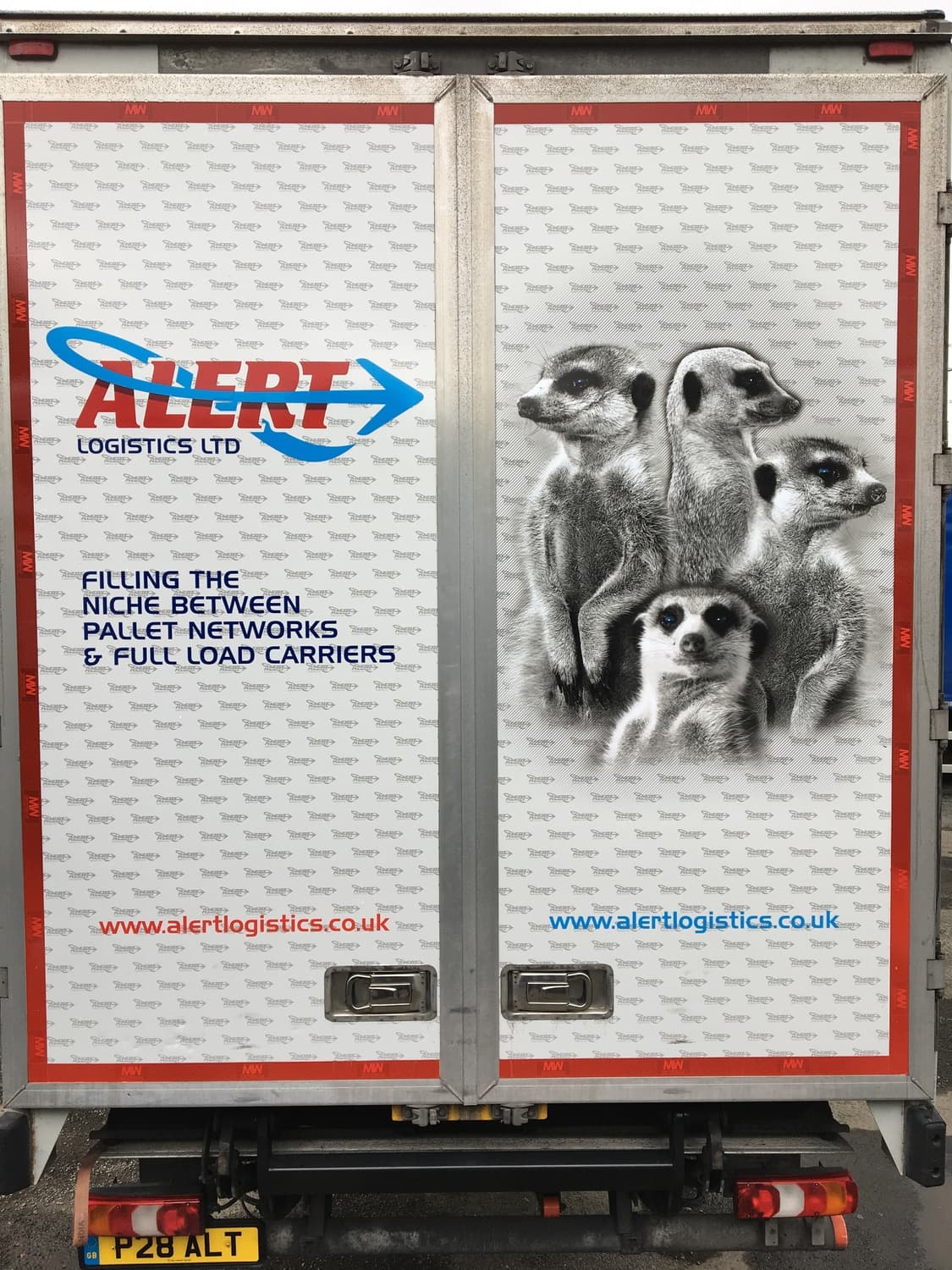 Truck cab with wolf, meerkats and leopard livery