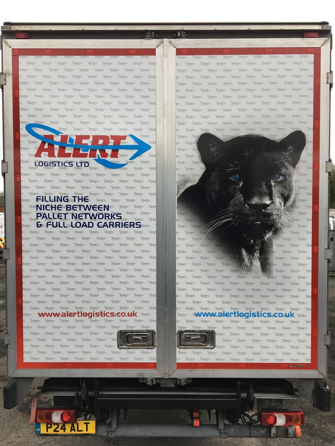 Truck cab with leopard, wolf and lion livery