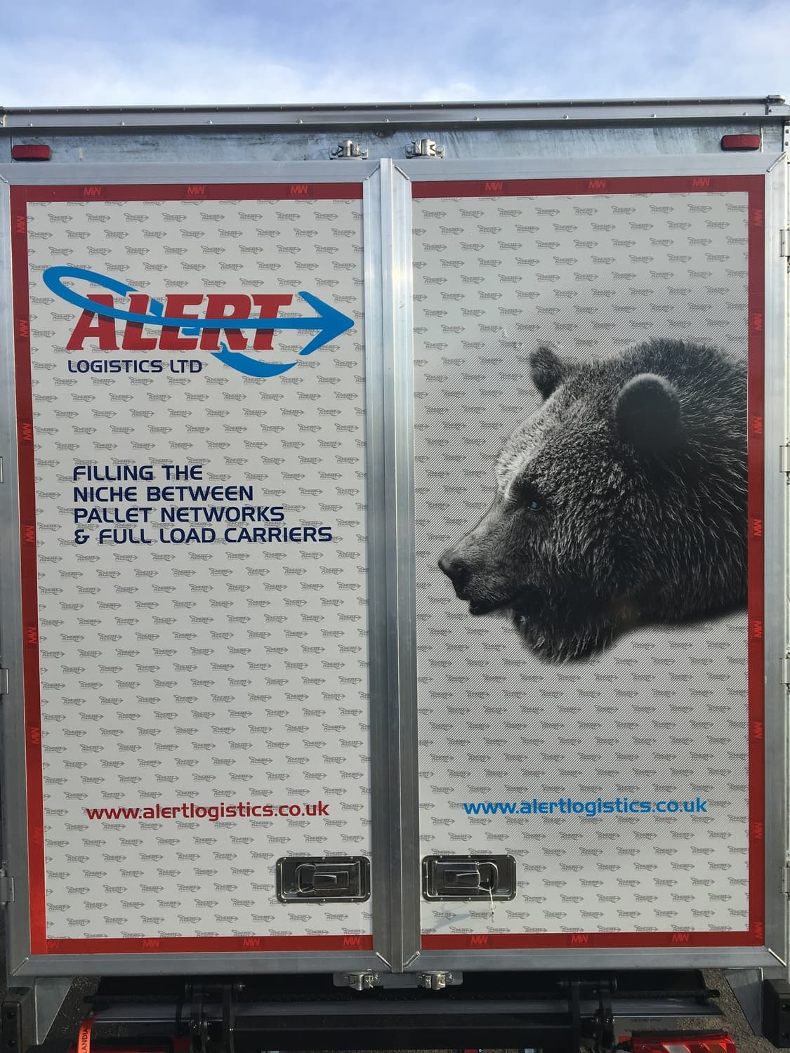 Rear of truck with African wild dog panel